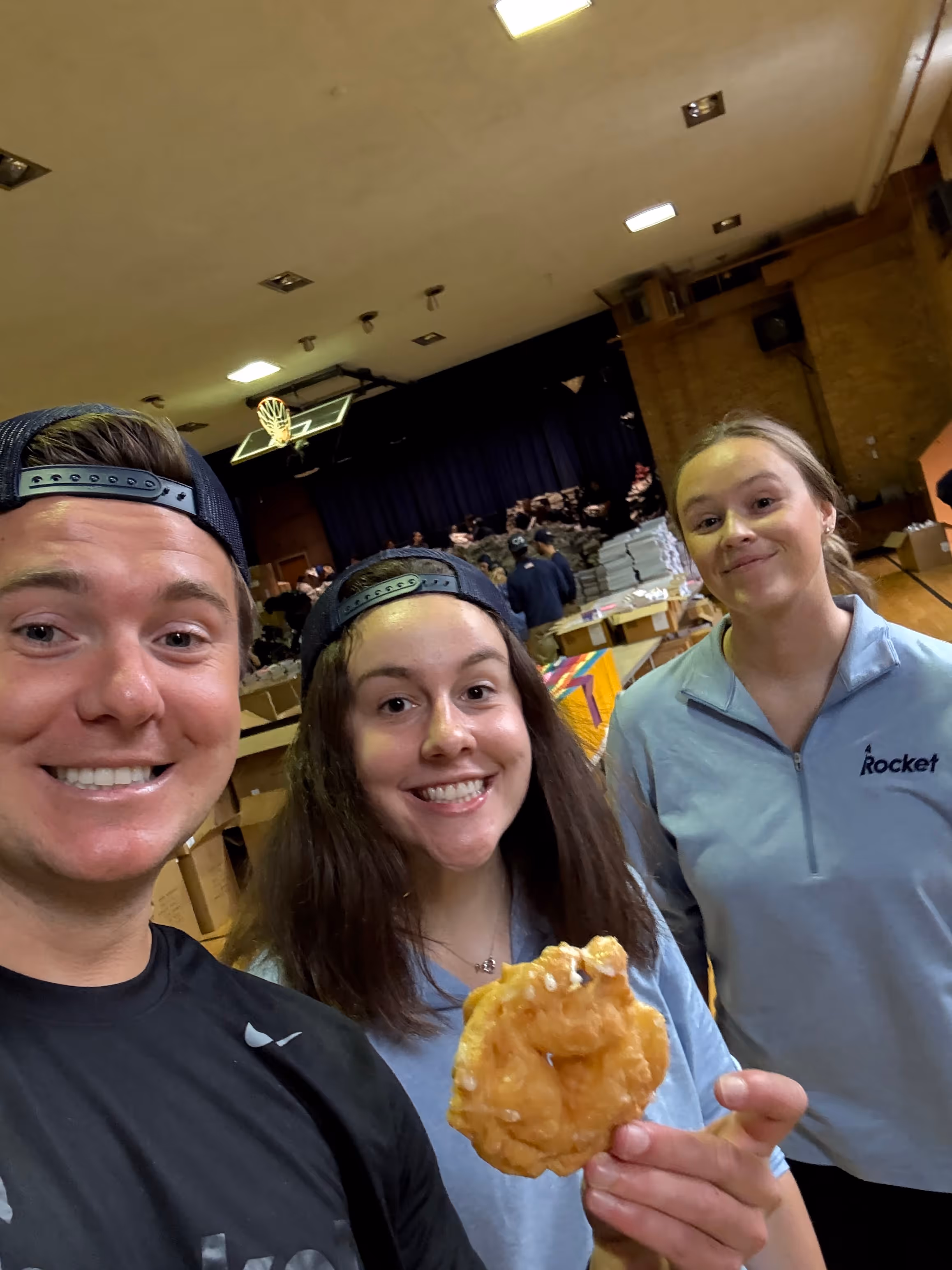 Rocket Alumni Solutions Team Eats Donut